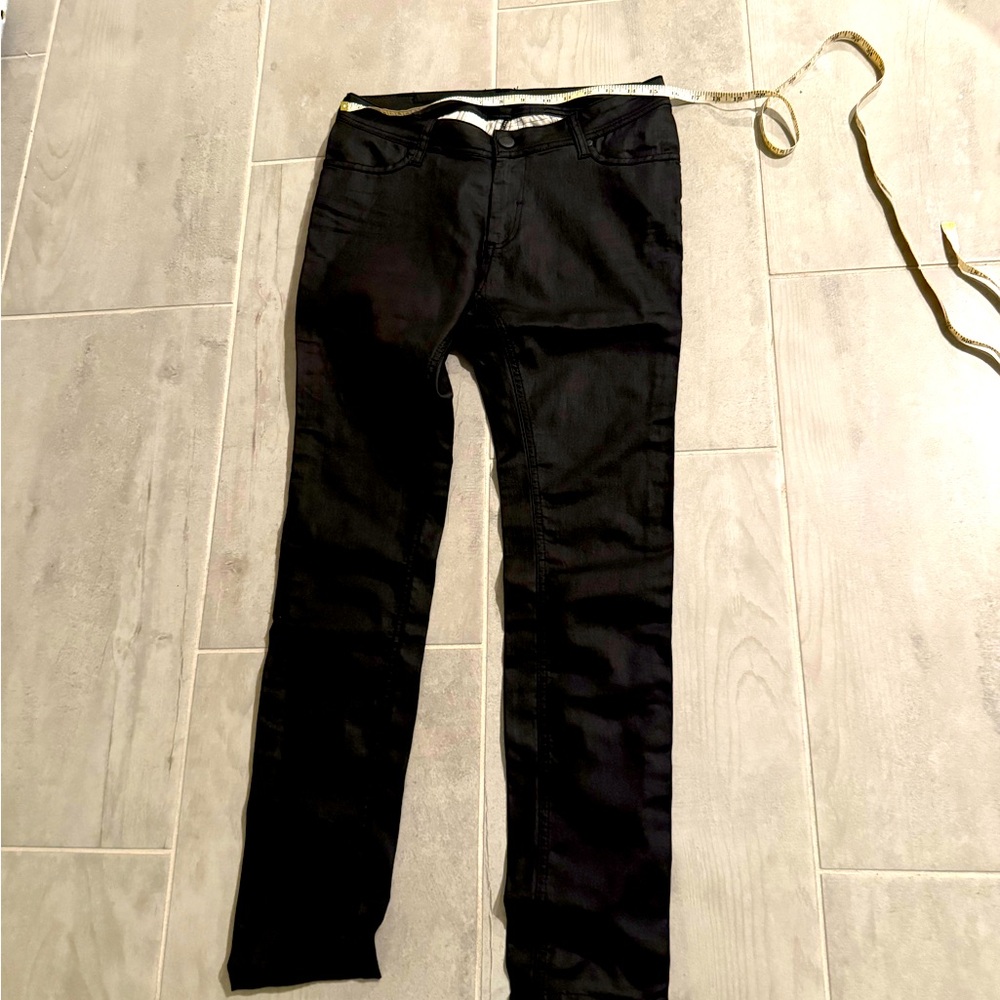 New cotton jeans coated in black color. Made in Turkey.